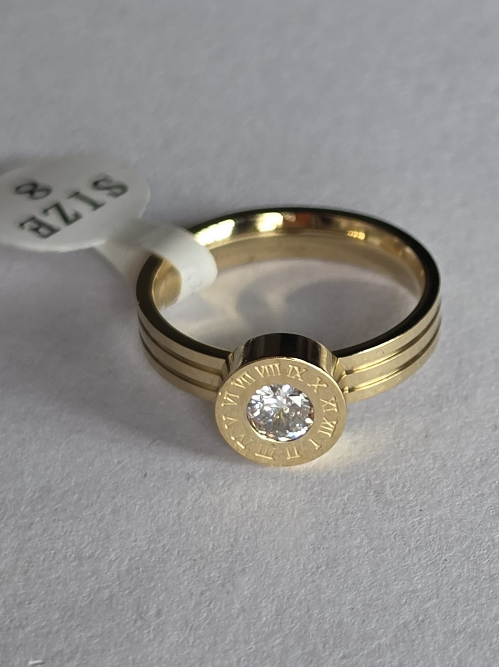 Gold Roman Numeral Stainless Steel Solitaire Ring with Clear Stone